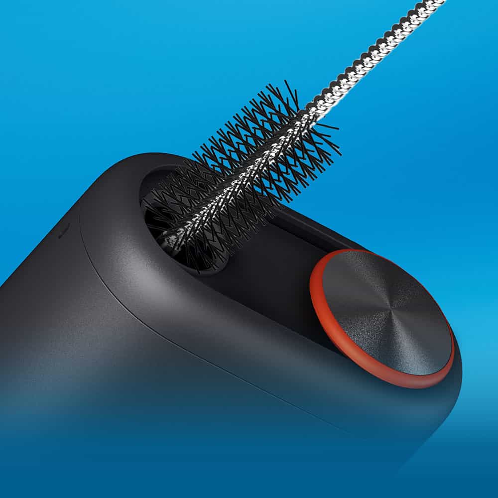 A close-up of a black cylindrical device with a round, red-edged button and a spiral brush being inserted into an opening, set against a blue background.