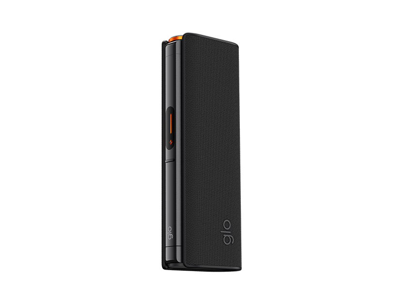 The glo™ HILO Plus Sleeve is a sleek black device with a premium fabric cover, an orange accent, and the glo logo at the bottom. It stands upright against a plain light gray background and features a small button on the side.